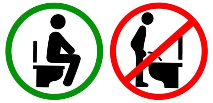 avisos en los lavabos para persuadir a sus invitados masculinos de sentarse en el retrete
